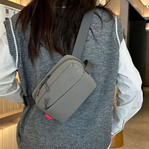 Bauchtasche Grau Damen, kompakt mit schrägem Reißverschlussfach