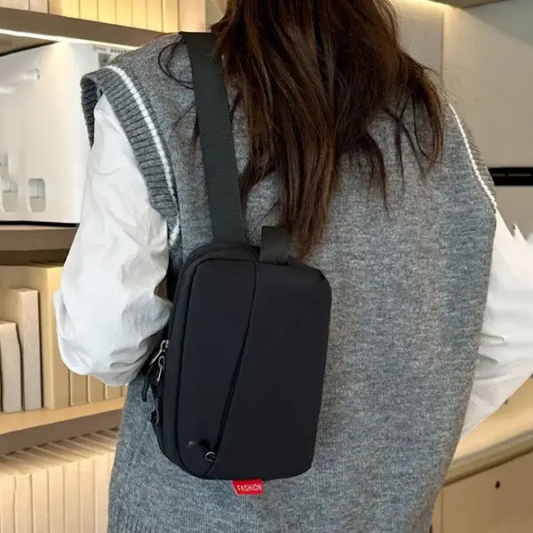 Bauchtasche Grau Damen, kompakt mit schrägem Reißverschlussfach – Bild 2